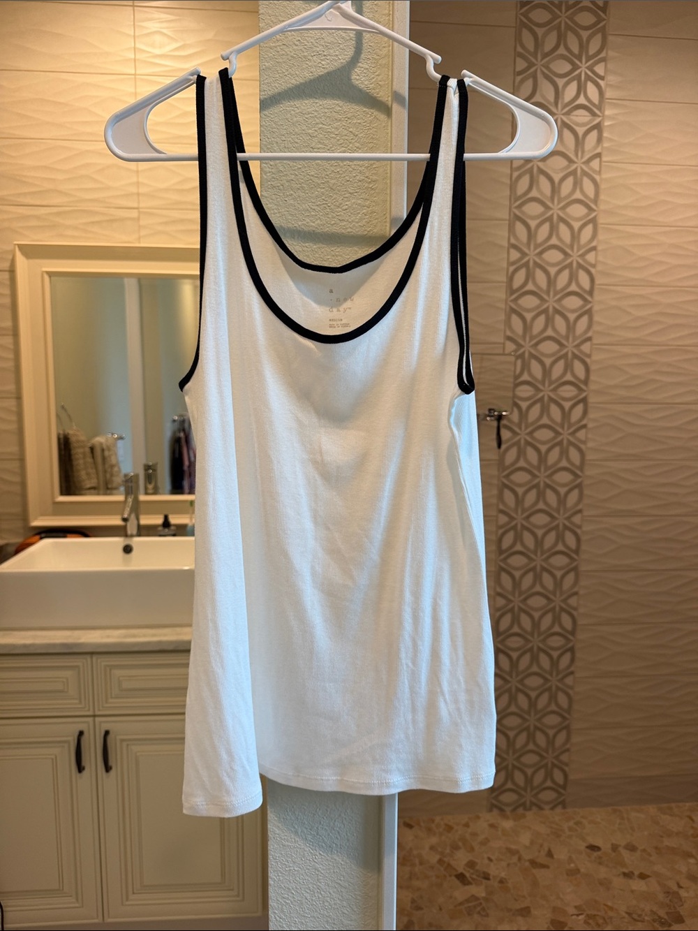 a new day White Tank with Black Trim